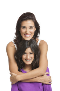 Mother smiling with her daughter