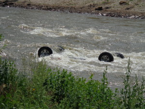 car-upside-down-submerged-in-river